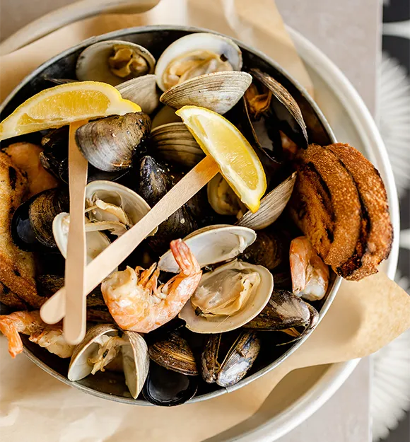 bucket, oysters, clams, and shrimp